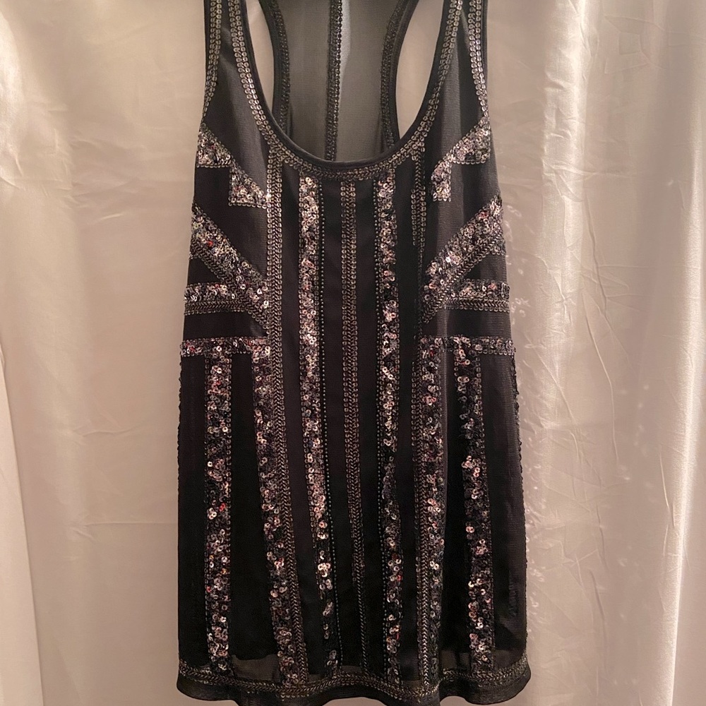 Express black lace over black with sparkly sequins in size med